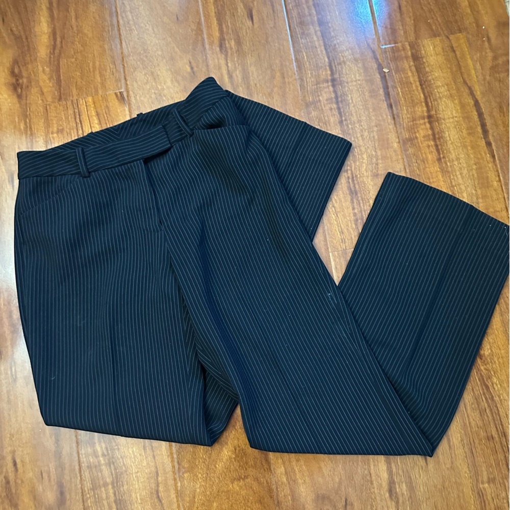 Black pinstripe trousers